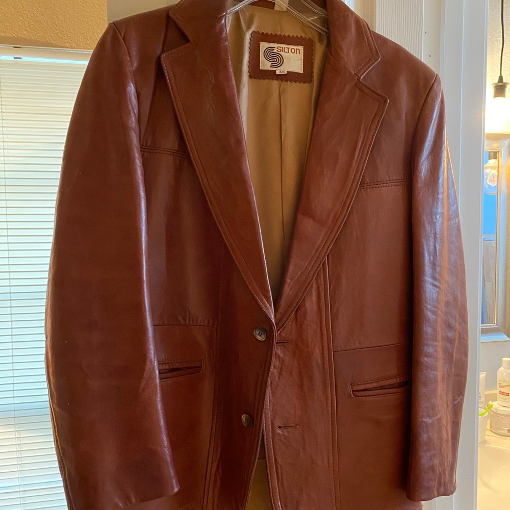 Men’s brown leather jacket.